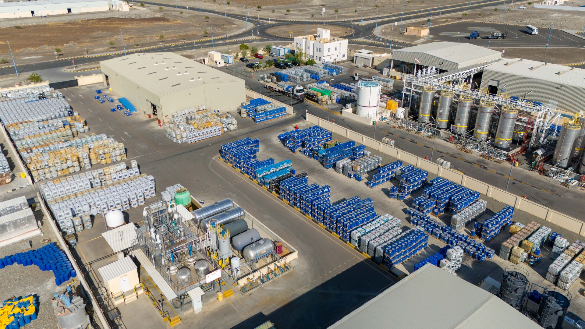 Wide aerial view of the OBS plant and tank storage